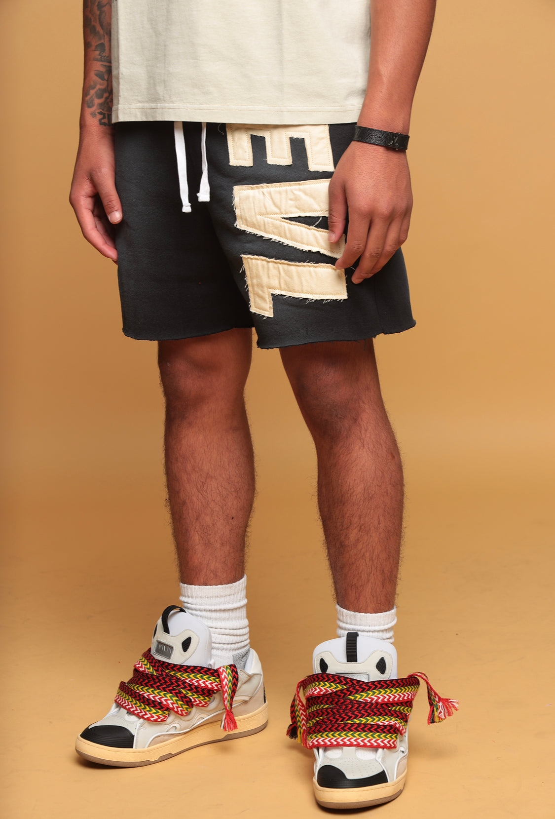 BLACK EVL SHORTS